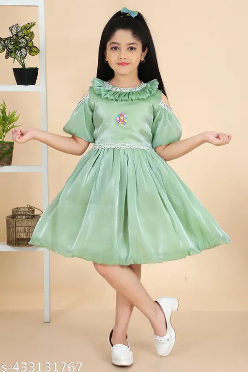 Light green chiffon girl's dress with ruffles