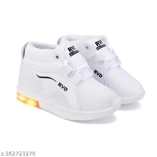 White sneakers with orange laces and a glowing sole