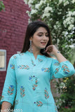 Rayon slub embroidered kurta with palazzos, three-quarter sleeves, printed net pattern. Indian women's ethnic wear on display