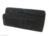 Black party clutch with chain link trim
