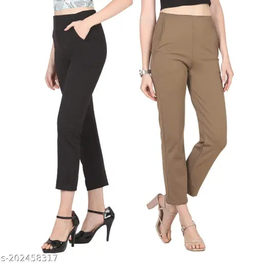 Two-piece women's trouser set in beige and black, featuring a flared fit with elastic waistband