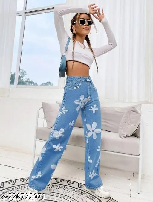 Light blue denim jeans with a floral print, wide legs