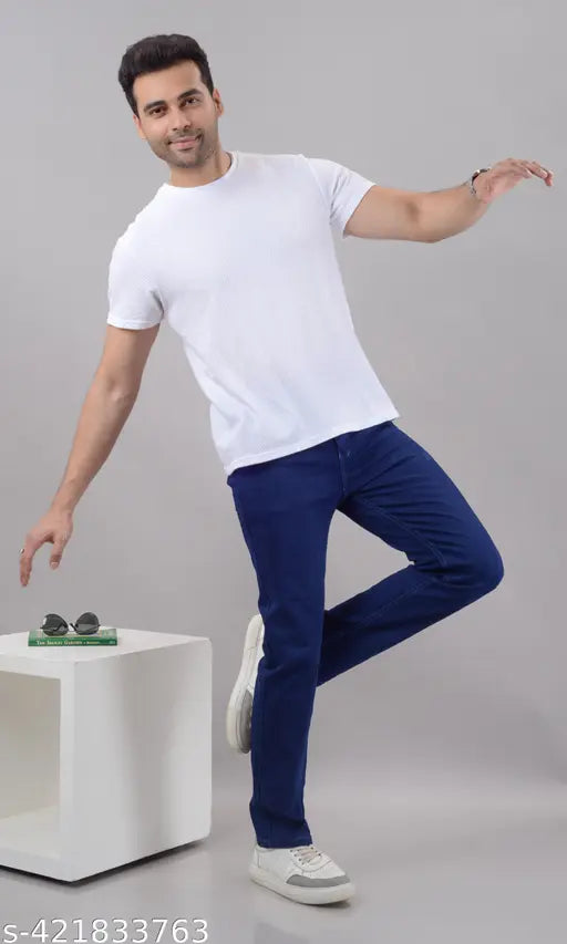 Blue stretchable denim jeans for men, solid pattern, versatile for casual and semi-formal occasions. Size options: 42, 44, 46, 48, 50 (Inches: 42/41/47, 44/44/49, 46/46/51, 48/48/53, 50/50/55). Made in India