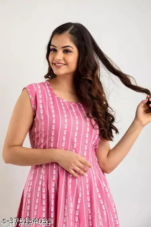 Colorful rayon sleeveless printed kurti, ideal for casual events and outings. Sizes range from S to 4XL. Made in India