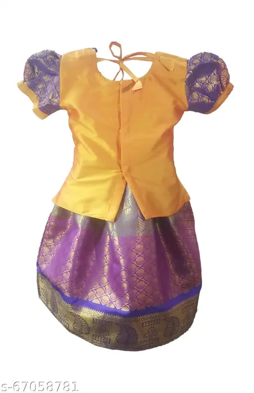 White cotton silk Kids' pattu pavadai & Lehenga choli set with embroidered tops and solid jacquard lehengas. Traditional Indian attire for girls aged 6-5 years