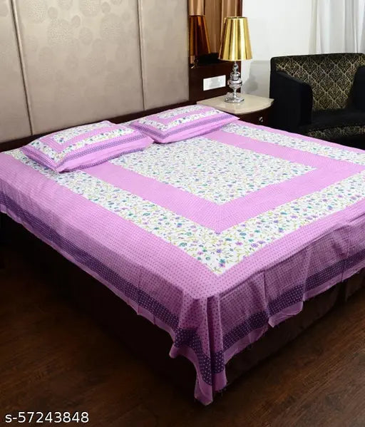 Purple cotton double bedsheet with floral pattern, includes 2 pillow covers.