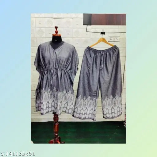 Trendy cotton blend kurta sets with printed net palazzos for women and girls, three-quarter sleeves in various sizes M-XXXL from India