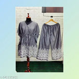 Trendy cotton blend kurta sets with printed net palazzos for women and girls, three-quarter sleeves in various sizes M-XXXL from India