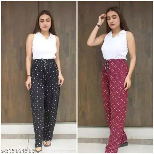 Red and black patterned jumpsuit with a V-neckline