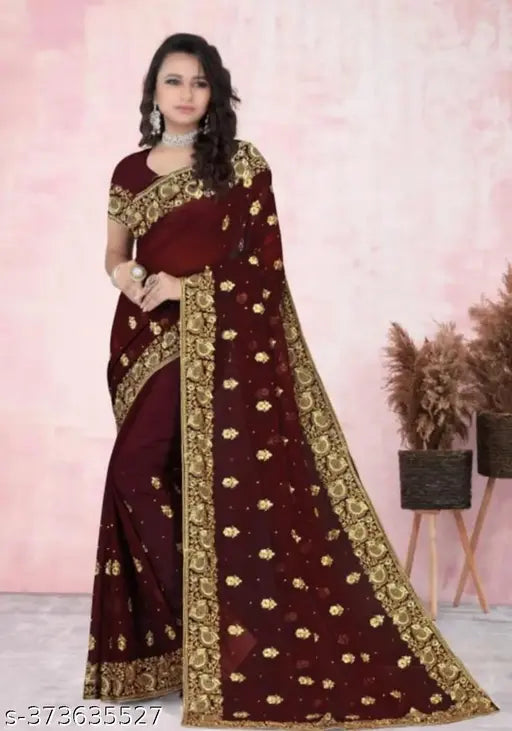 Red and gold embellished saree with pallu