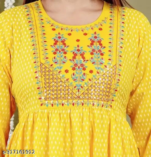 Yellow rayon Naira cut kurti, intricate embroidery work, three-quarter sleeves. Ethnic wear for women's party wear, size S-6XL. Machine washable, first wash with salt water