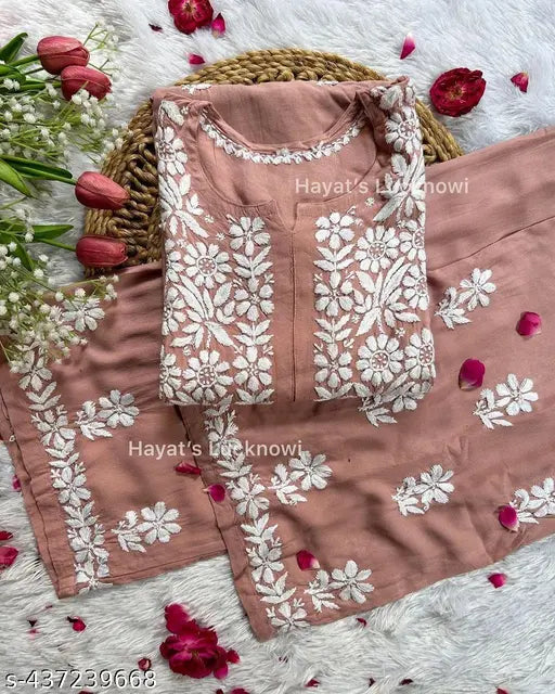 Rayon Chikankari embroidery kurta set with plazzo pants, printed net pattern on display