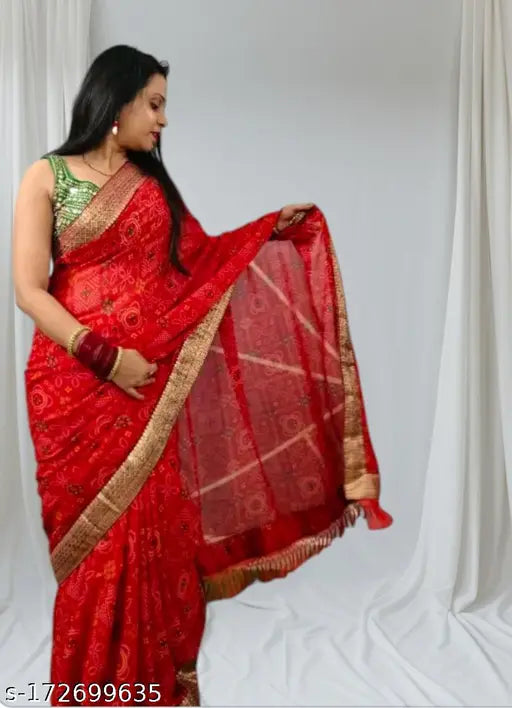 Red and gold traditional Indian saree with pallu