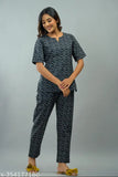Cotton printed v-neck night suit for women & girls, featuring a loose, comfortable design and vibrant prints - India origin