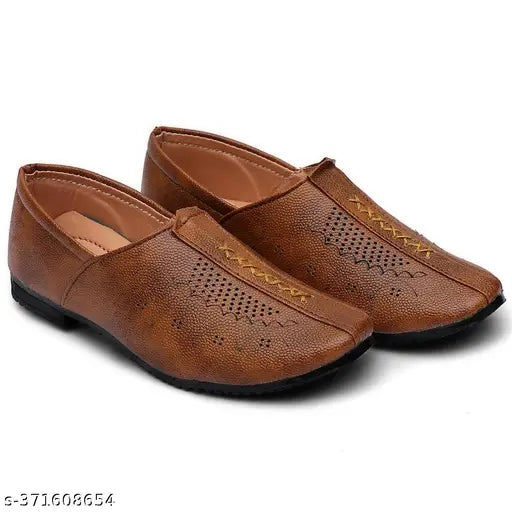 Brown leather shoes with perforated detail, suitable for a child