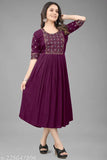 Purple rayon embroidered kurti, three-quarter sleeves. Traditional Indian fashion for functions, festivals, parties, and weddings