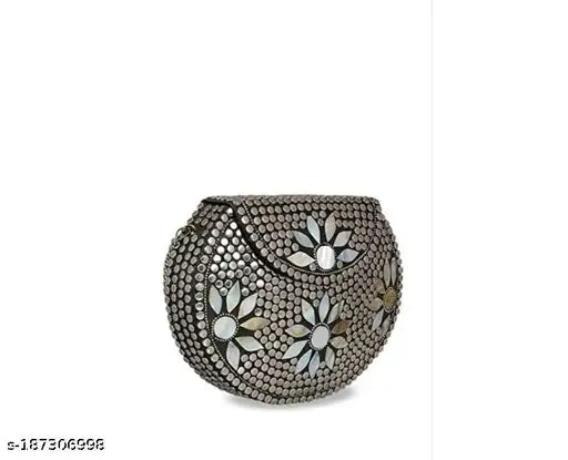 Silver and black decorative bowl with floral motif