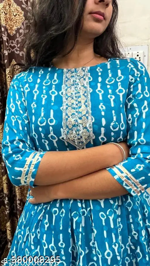 Stylish blue and white kurta set with long sleeves, featuring embroidered detailing