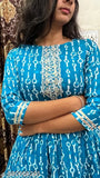 Stylish blue and white kurta set with long sleeves, featuring embroidered detailing