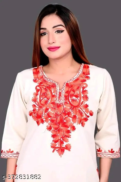 White embroidered woolen aari kameez with paisley design