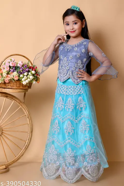 Indian net lehenga-choli set for girls, vibrant printed and embellished with mirror work, perfect for festivals and weddings