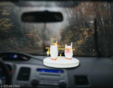 A hand statue of Lord Krishna with a peacock feather and brass flute, presented on a car dashboard as a decorative idol
