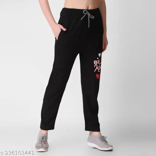 Black jogging pants with white drawstrings, logo on waistband