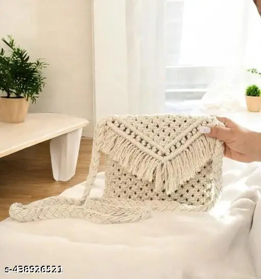 Handmade bohemian cotton tote, features unique tassel accents, ideal for casual and beachwear styles