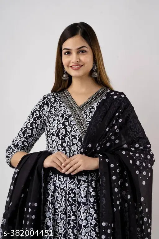 Black premium rayon-cotton Anarkali embroidery kurti set with pant and dupatta, intricately detailed print design on three-quarter sleeves kurti