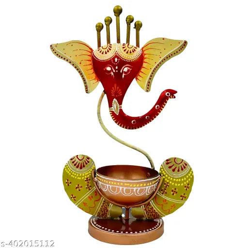 Handcrafted Metal Ganesha T-Light Holder, 3" Breadth x 11" Height x 6" Length, exudes spiritual elegance and metal artistry. Adds vibrancy to any decor style, perfect for festive occasions or meditation spaces