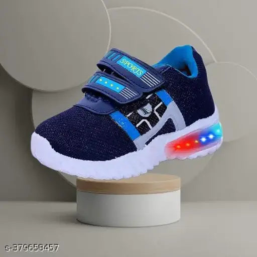 A pair of blue shoes with blue and white laces, a vibrant red light on the sole, and a playful design