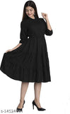 Black cotton ruffled high-neck dress