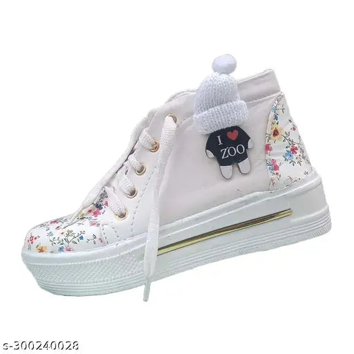 White EVA PVC embellished shoe for kids (4-4.5 years), on a display stand