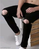 Black distressed denim jeans with knee holes for men