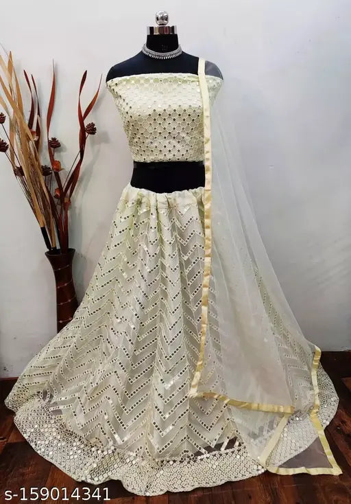 White net lehenga set with mirror work, featuring Choli and dupatta. Free size, originates from India