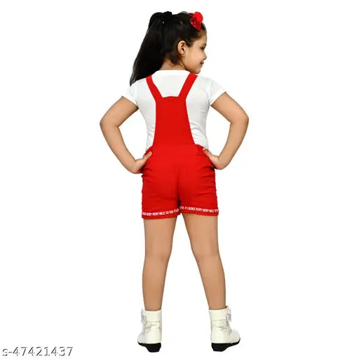 Red half-sleeved cotton blend dungaree with white T-shirt on young girl against white background