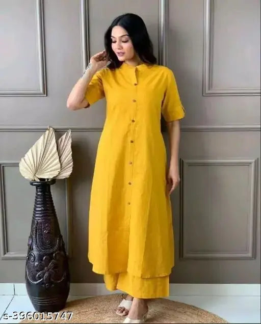 Yellow rayon kurta set with palazzos, short-sleeved, solid pattern, single size from Katha Woman India