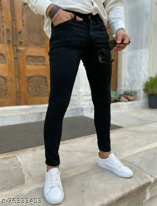 Black denim jeans for men, ankle length, slim fit, fully stretchable and comfortable. Premium quality, solid pattern. Made in India