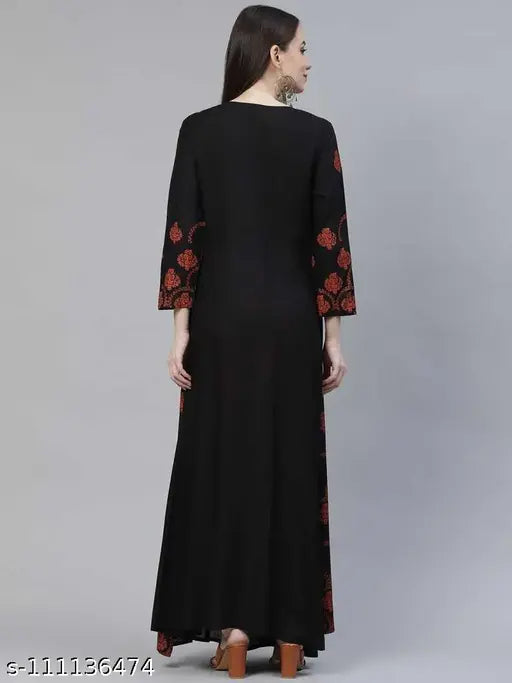 A blue A-line midi dress with a floral pattern and gold accents