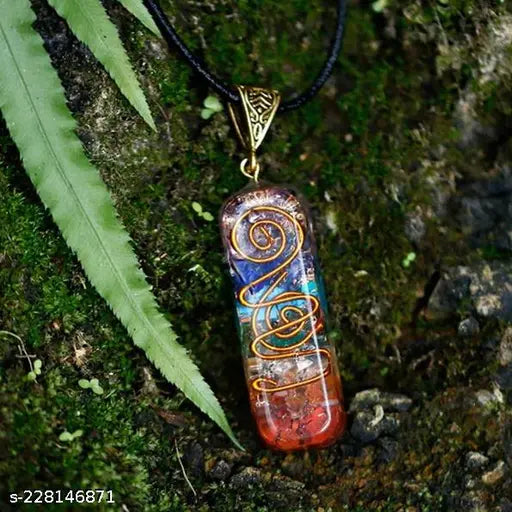 Crystal Type 7 Chakra Orgone Pendant, handmade natural healing stone with chain for Reiki and crystal healing, approx. dimensions 1x4x1 cm, made by Reshamm Crystal Products, origin India