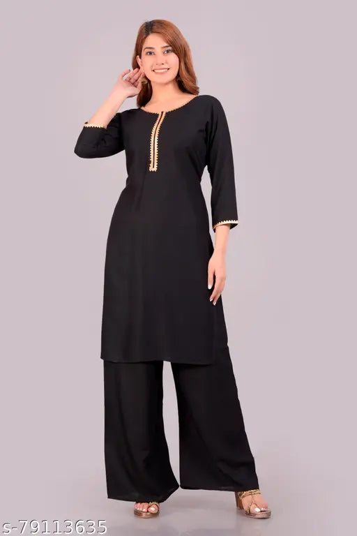 Rayon straight kurta with palazzo, solid pattern, three-quarter sleeves, rayon fabric on model
