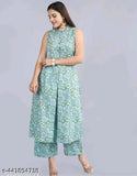 Green rayon kurta with printed net palazzo, three-quarter sleeves set for women's fashion, Indian handwork detail on display