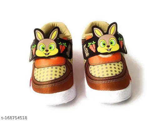 The image shows a pair of children's shoes with a cartoon character on the straps. The shoes appear to be casual, likely made of jelly material, suitable for children aged 14 years and are available in sizes for both boys and girls. They have a single velcro closure at the back for easy fit adjustment