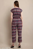 Multi floral print crepe jumpsuit for women & girls, vibrant summer fashion on model