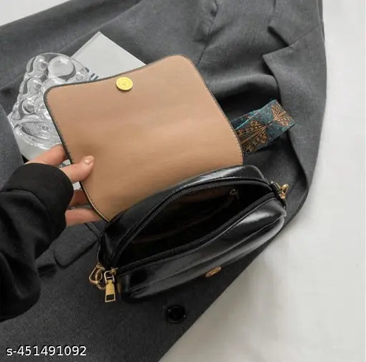Trendy Korean style crossbody mini handbag with a zip closure, featuring a chain strap and a small rectangular clutch attachment inside