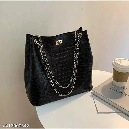 Trendy black women's cross-body handbag with chain strap