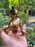 Gold-toned brass Krishna baby statuette, hand-painted Netr Shringar idol for pooja, 8x5x8 cm, Indian religious decor