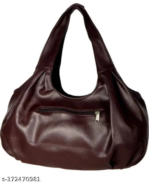 Brown leather handbag with adjustable strap