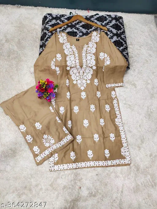 Embroidered Rayon Kurta and Palazzo Set, three-quarter sleeves, Indian chikankari work with dupatta set on display