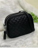 Fashionable black leather sling bag with zip closure, designed for women